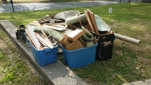 An employee at Rubbish Ready Junk Removal